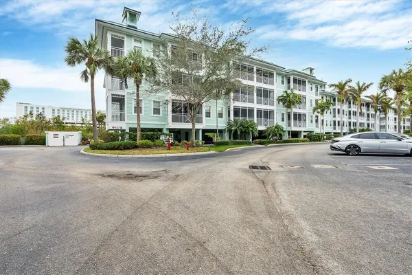 a city street lined with buildings and trees