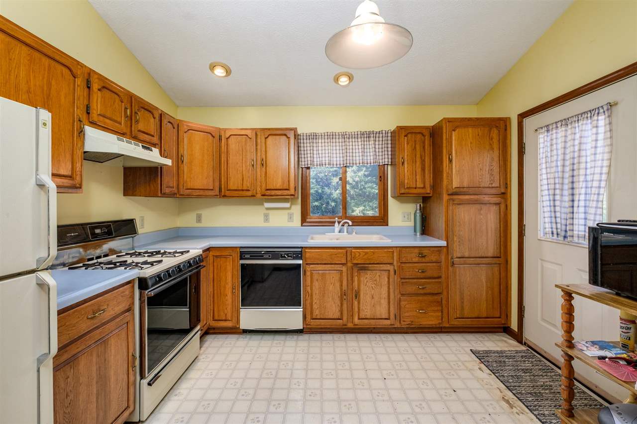 5310 Williams Run Road Mount Crawford, VA 22841 - Photo 3 of 42 a kitchen with stainless steel appliances granite countertop a stove a sink and a refrigerator