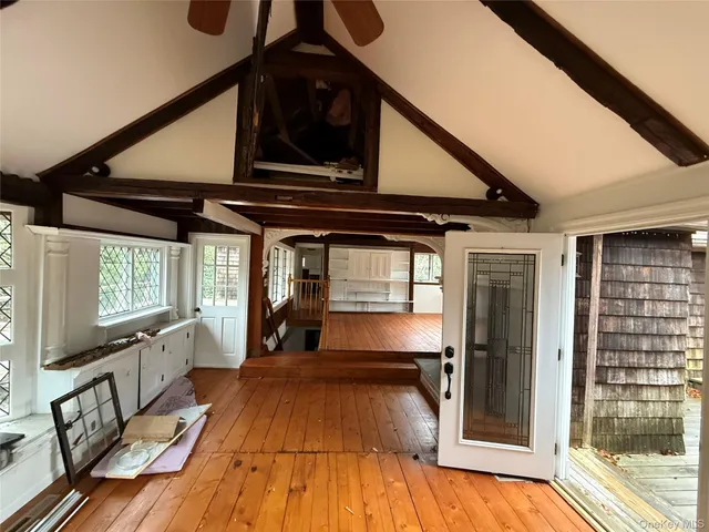 a view of a wooden door of the house