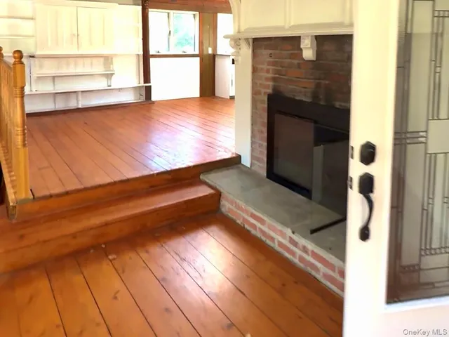 a view of kitchen and wooden floor