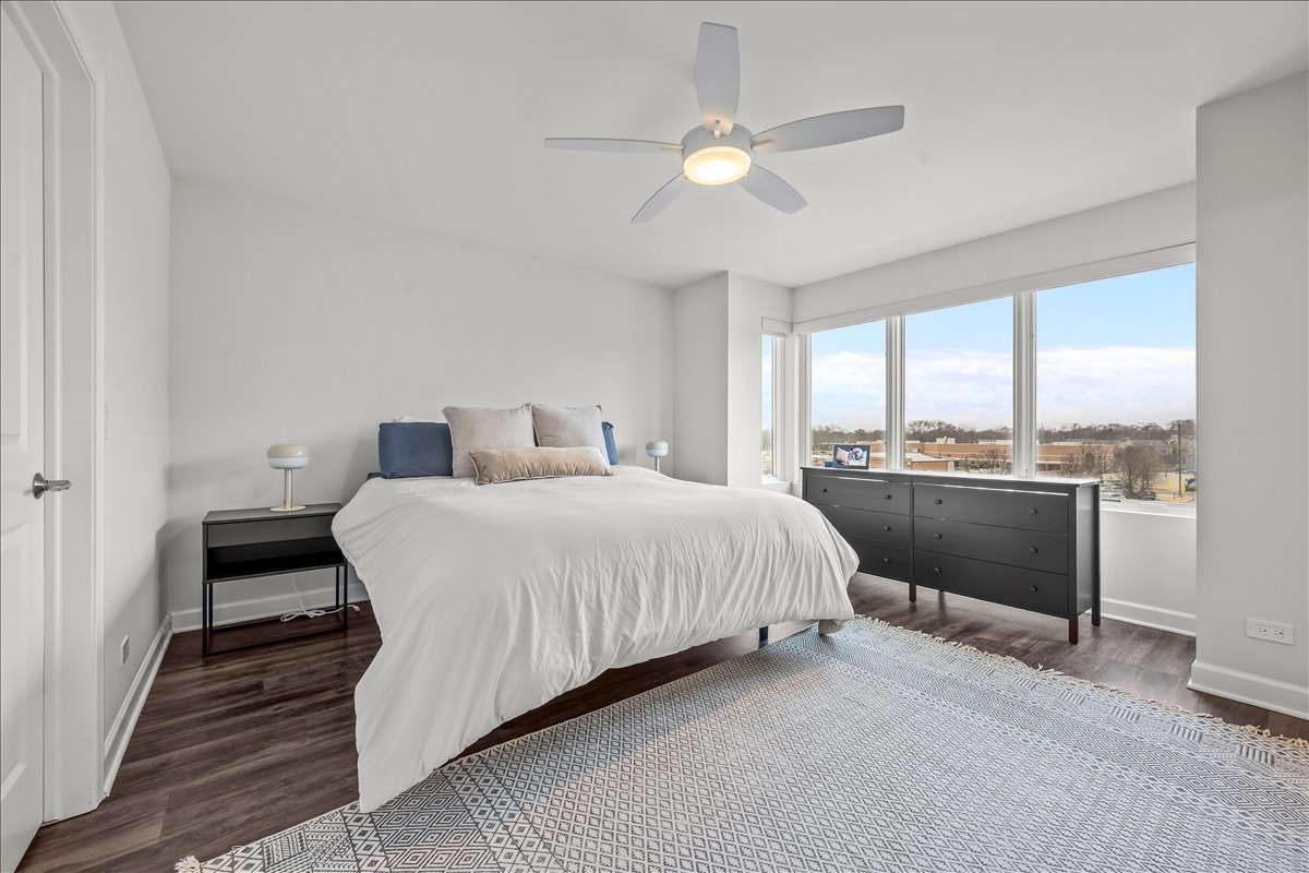 1229 Shermer Road Northbrook, IL 60062 - Photo 7 of 22 a bedroom with a bed and a large window