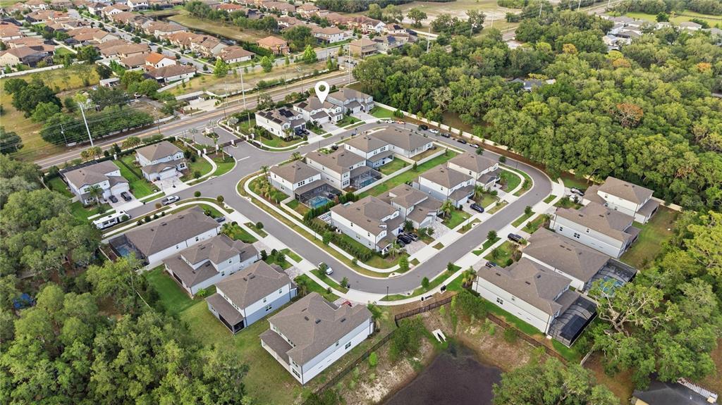 13816 Sharp Hawk Drive Riverview, FL 33569 - Photo 73 of 76 an aerial view of residential building with parking