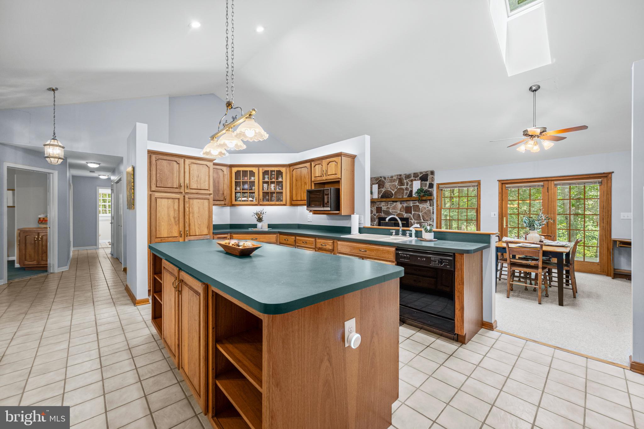 1160 Mt Hope Road Fairfield, PA 17320 - Photo 23 of 34 a kitchen with stainless steel appliances granite countertop a stove a sink dishwasher and a refrigerator