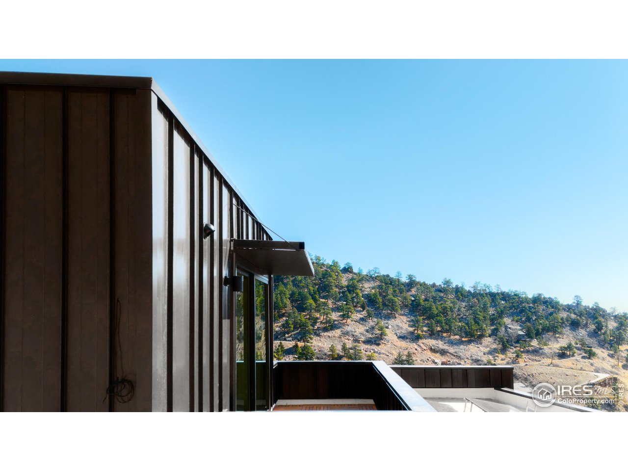 1575 Linden Drive Boulder, CO 80304 - Photo 33 of 40 Primary balcony and steel siding.