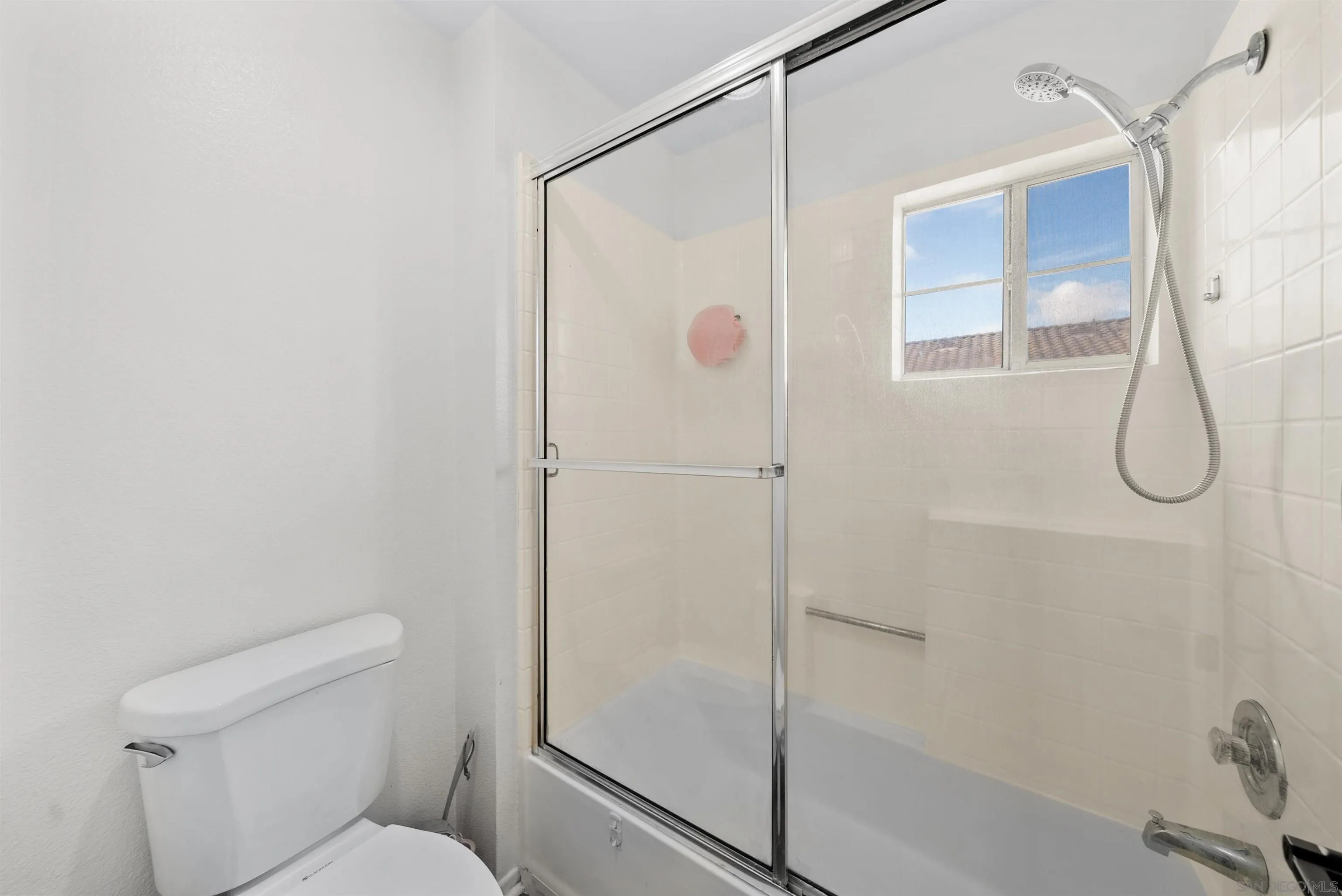 2291 Cabo Bahia Chula Vista, CA 91914 - Photo 23 of 45 a bathroom with a shower and toilet