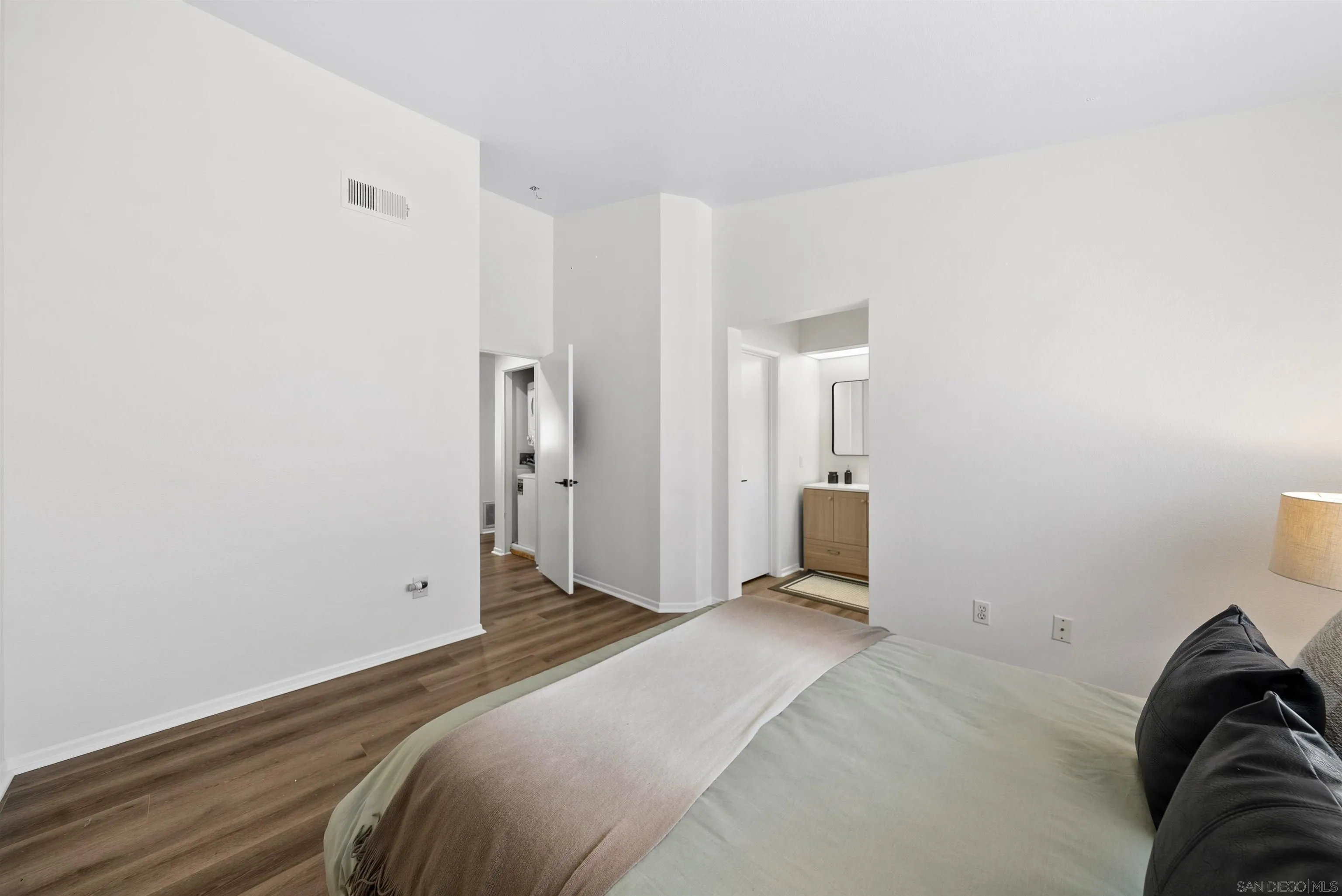 2291 Cabo Bahia Chula Vista, CA 91914 - Photo 27 of 45 a bedroom with a bed and a window