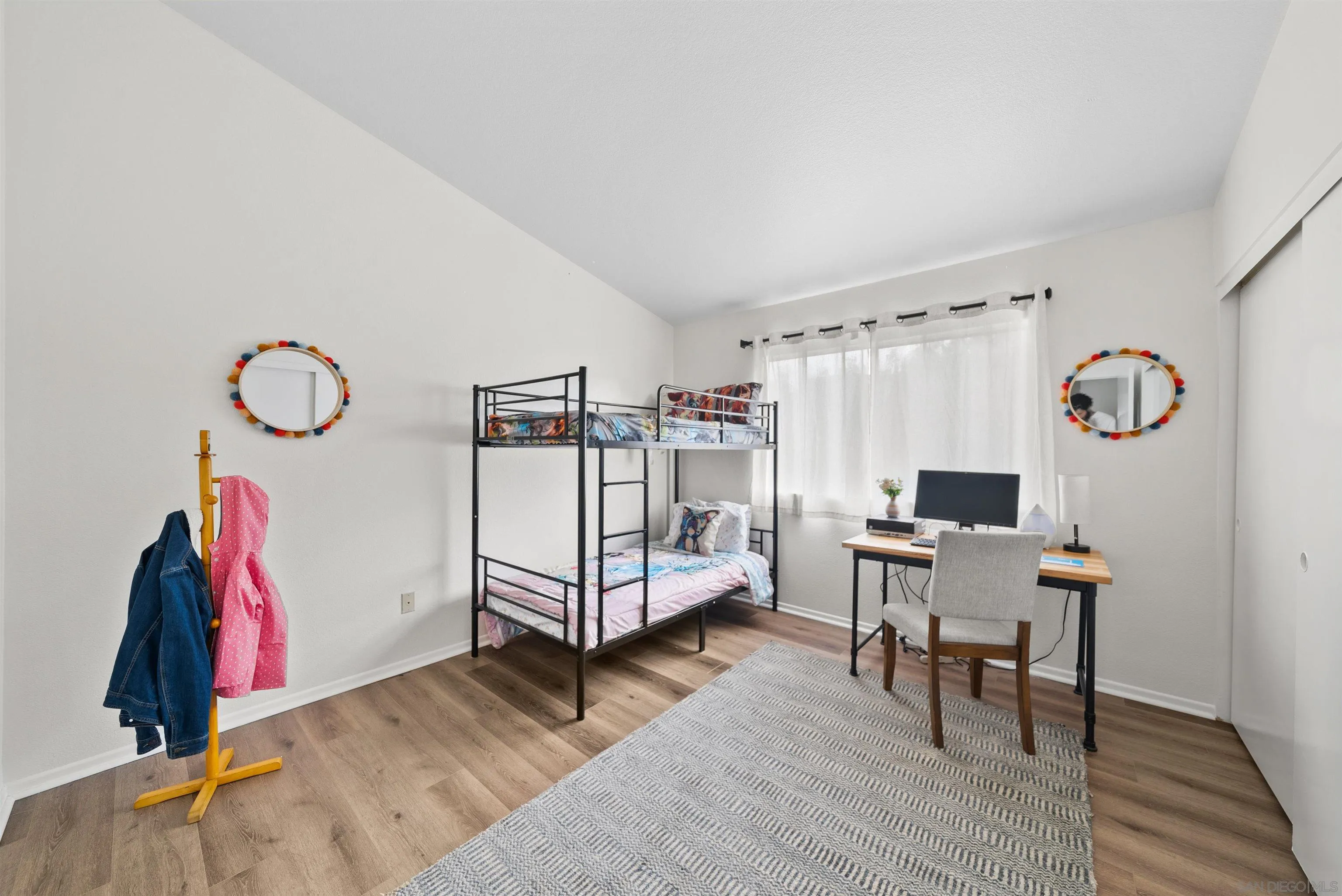 2291 Cabo Bahia Chula Vista, CA 91914 - Photo 28 of 45 a bedroom with furniture and a bed