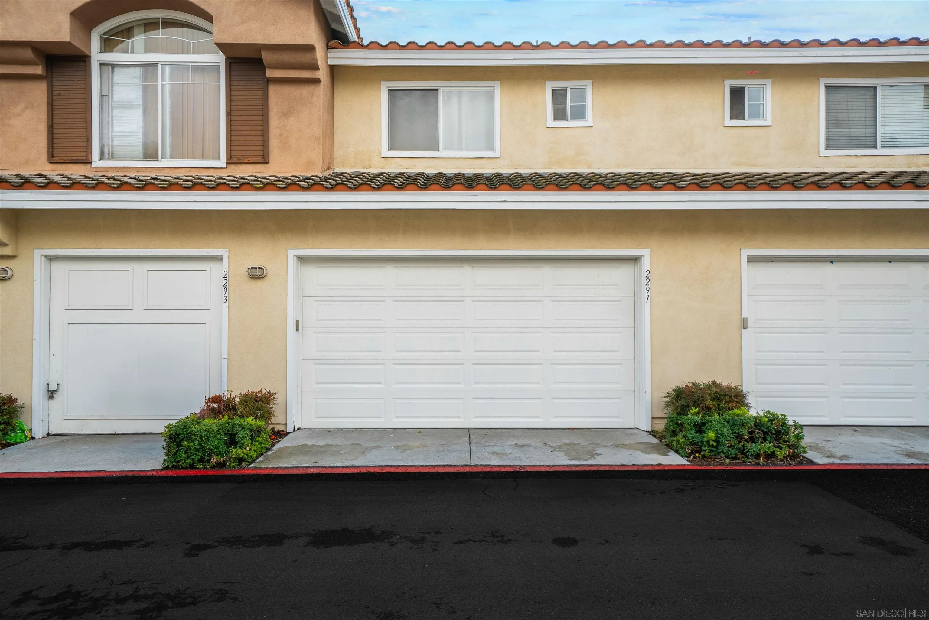 2291 Cabo Bahia Chula Vista, CA 91914 - Photo 36 of 45 a front view of a house with garage
