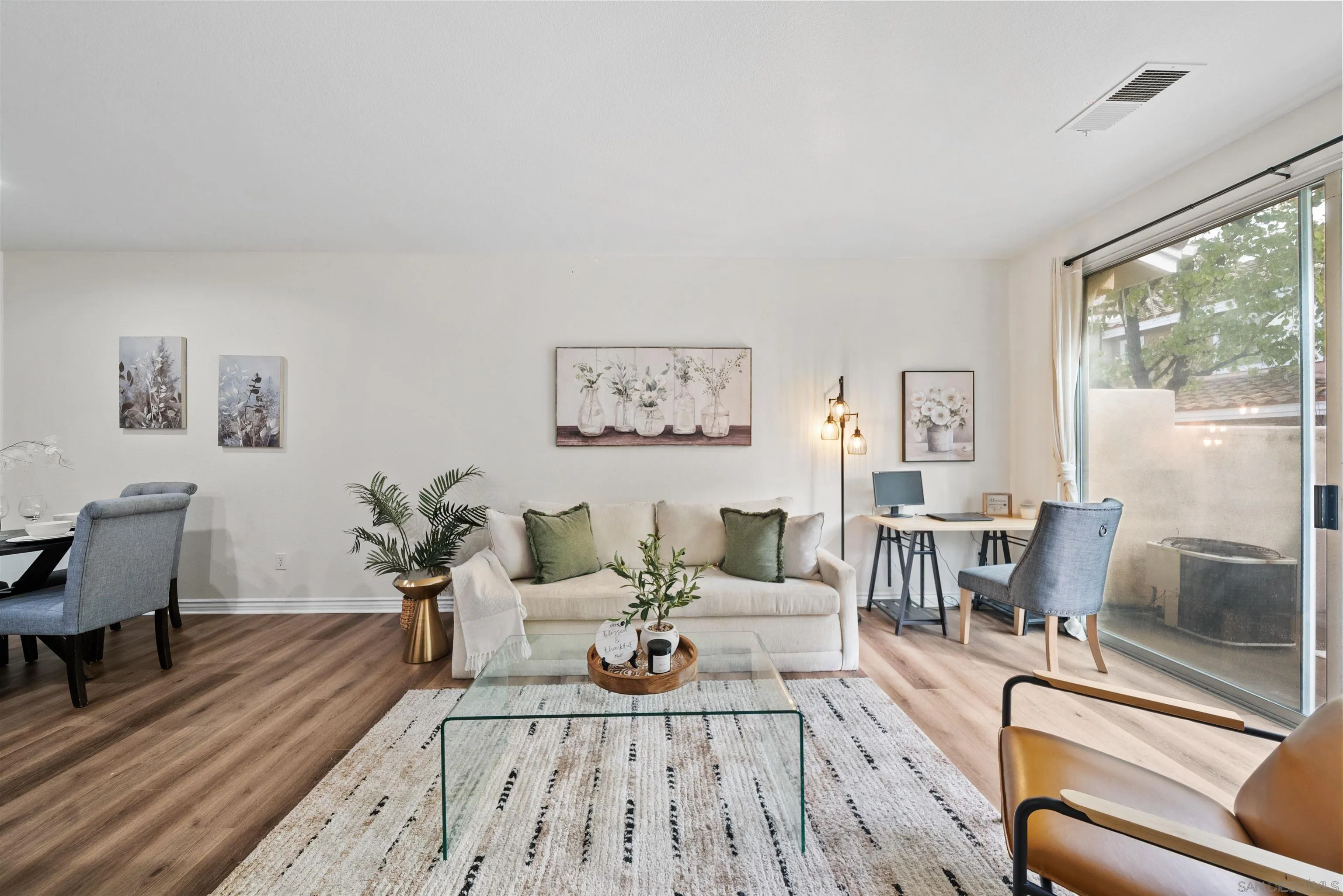2291 Cabo Bahia Chula Vista, CA 91914 - Photo 4 of 45 a living room with furniture and a large window
