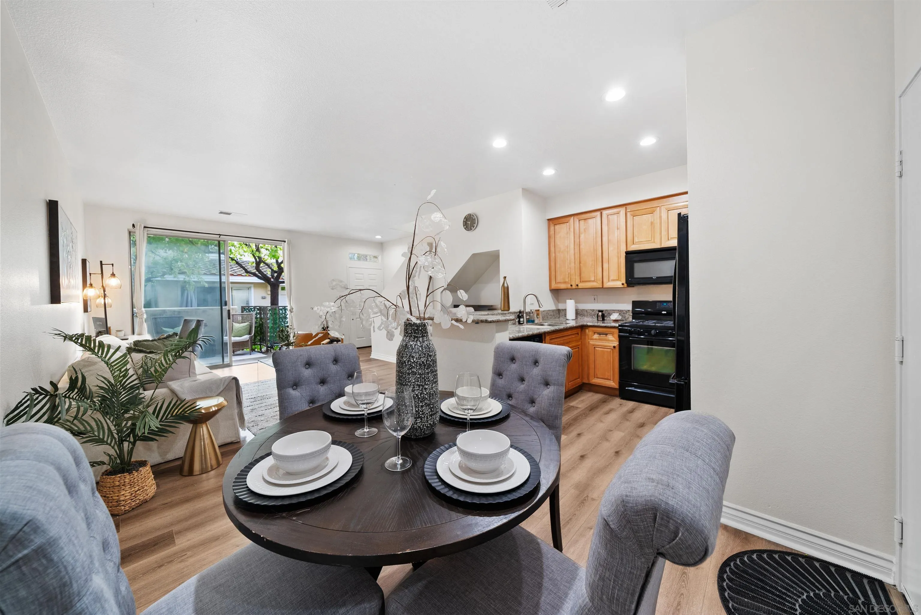 2291 Cabo Bahia Chula Vista, CA 91914 - Photo 6 of 45 a dining room with furniture and wooden floor