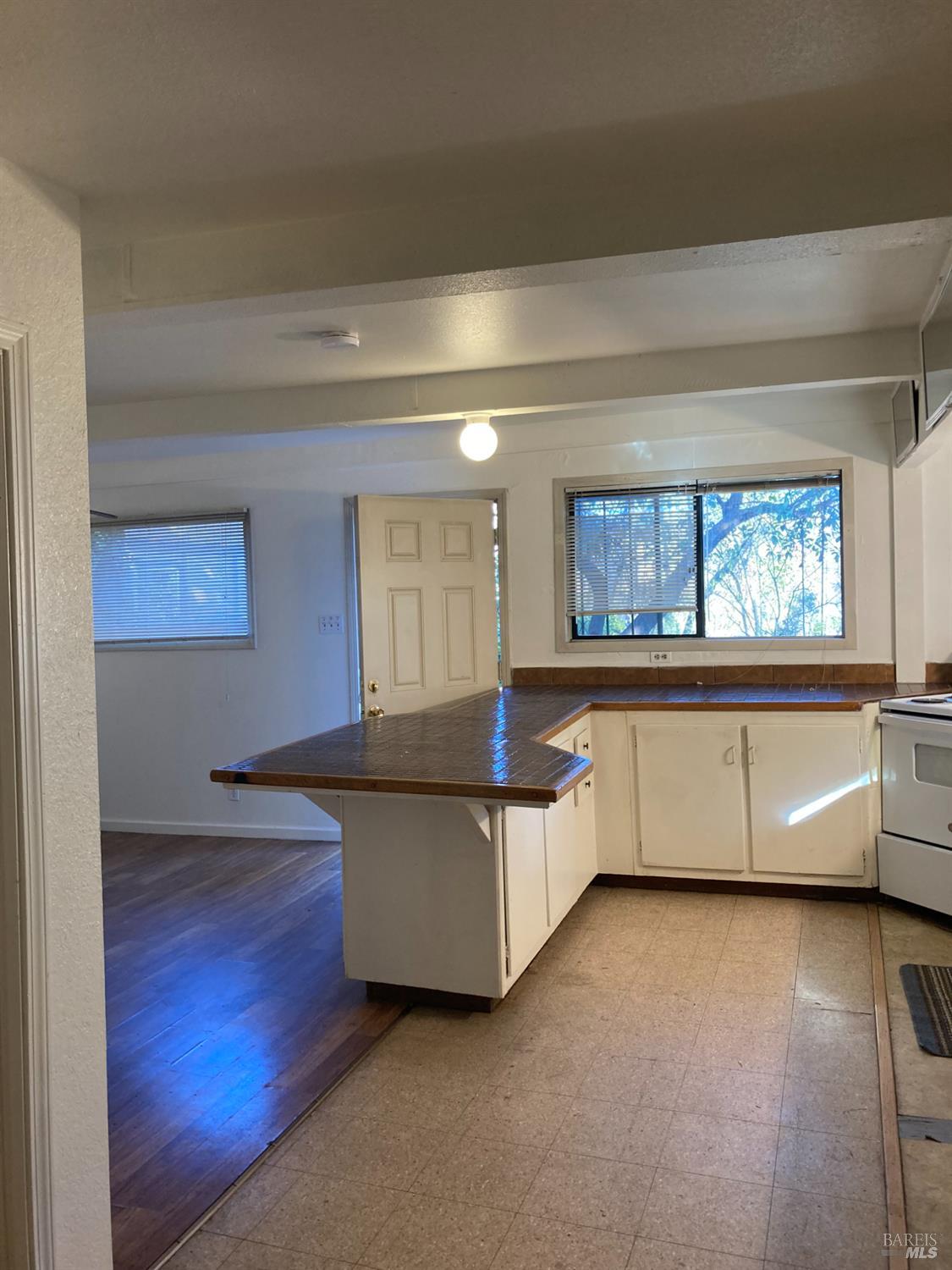 2140 South State Street Ukiah, CA 95482 - Photo 40 of 67 a living room with furniture and a large window