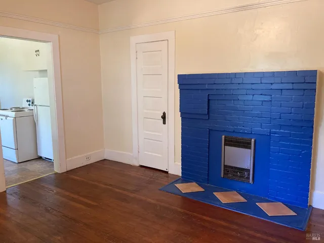 wooden floor and windows in an empty room