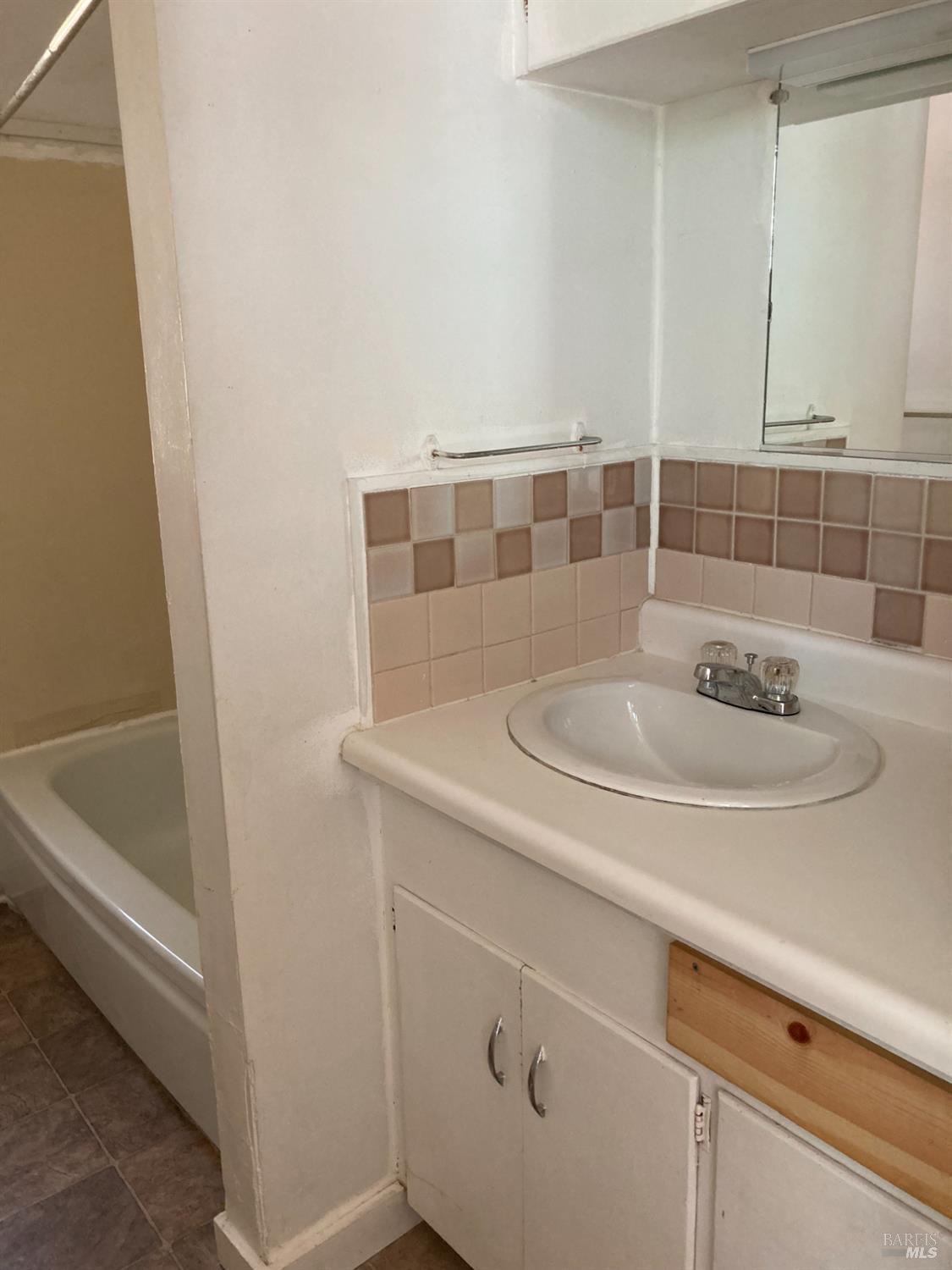 2140 South State Street Ukiah, CA 95482 - Photo 48 of 67 a bathroom with a sink and a tub