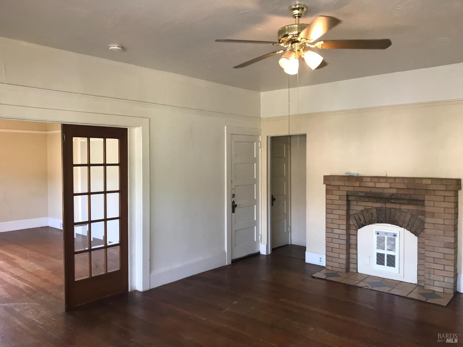 2140 South State Street Ukiah, CA 95482 - Photo 55 of 67 a view of a livingroom with a fireplace and wooden floor