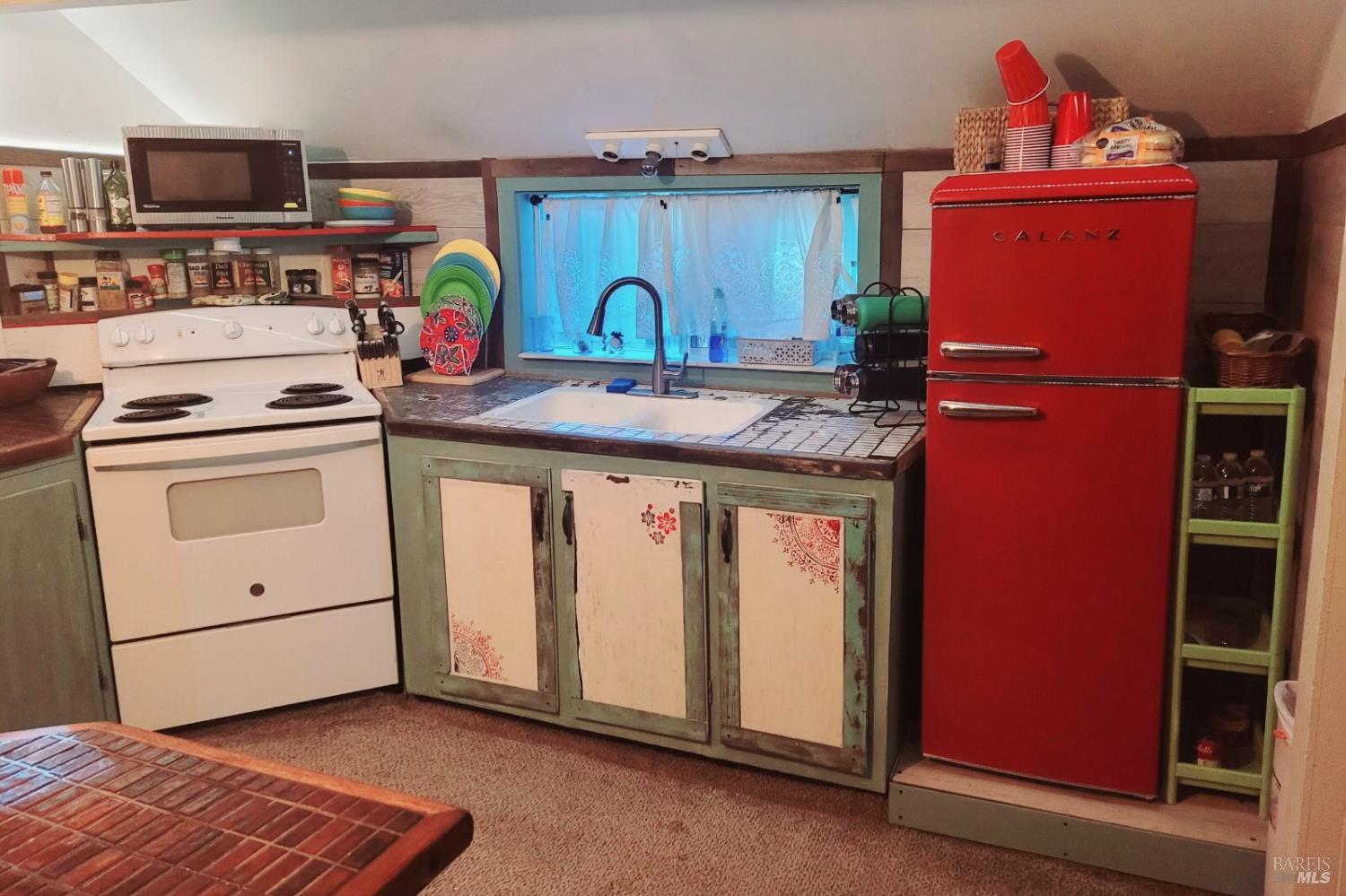 2140 South State Street Ukiah, CA 95482 - Photo 57 of 67 a kitchen with stainless steel appliances granite countertop a stove a sink and a refrigerator