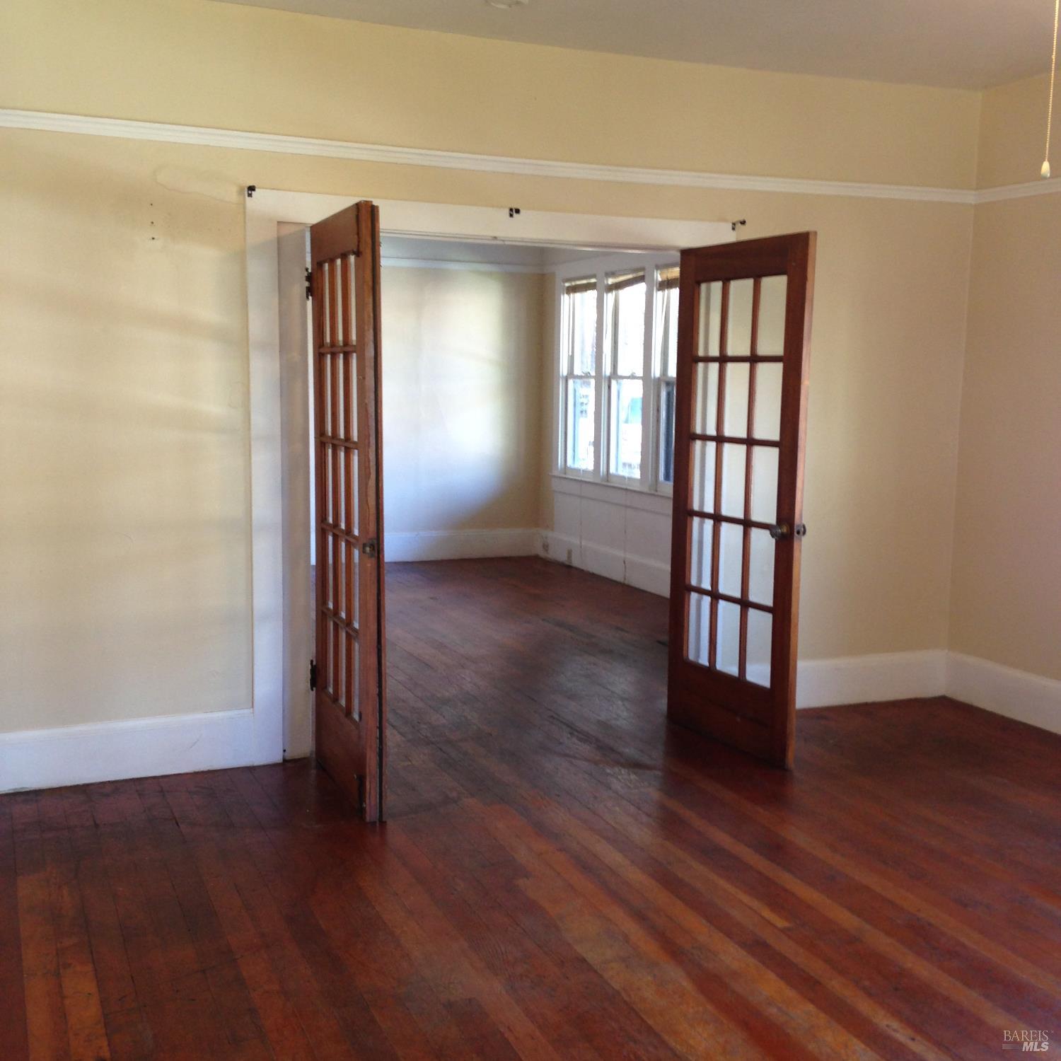 2140 South State Street Ukiah, CA 95482 - Photo 61 of 67 wooden floor and windows in an empty room