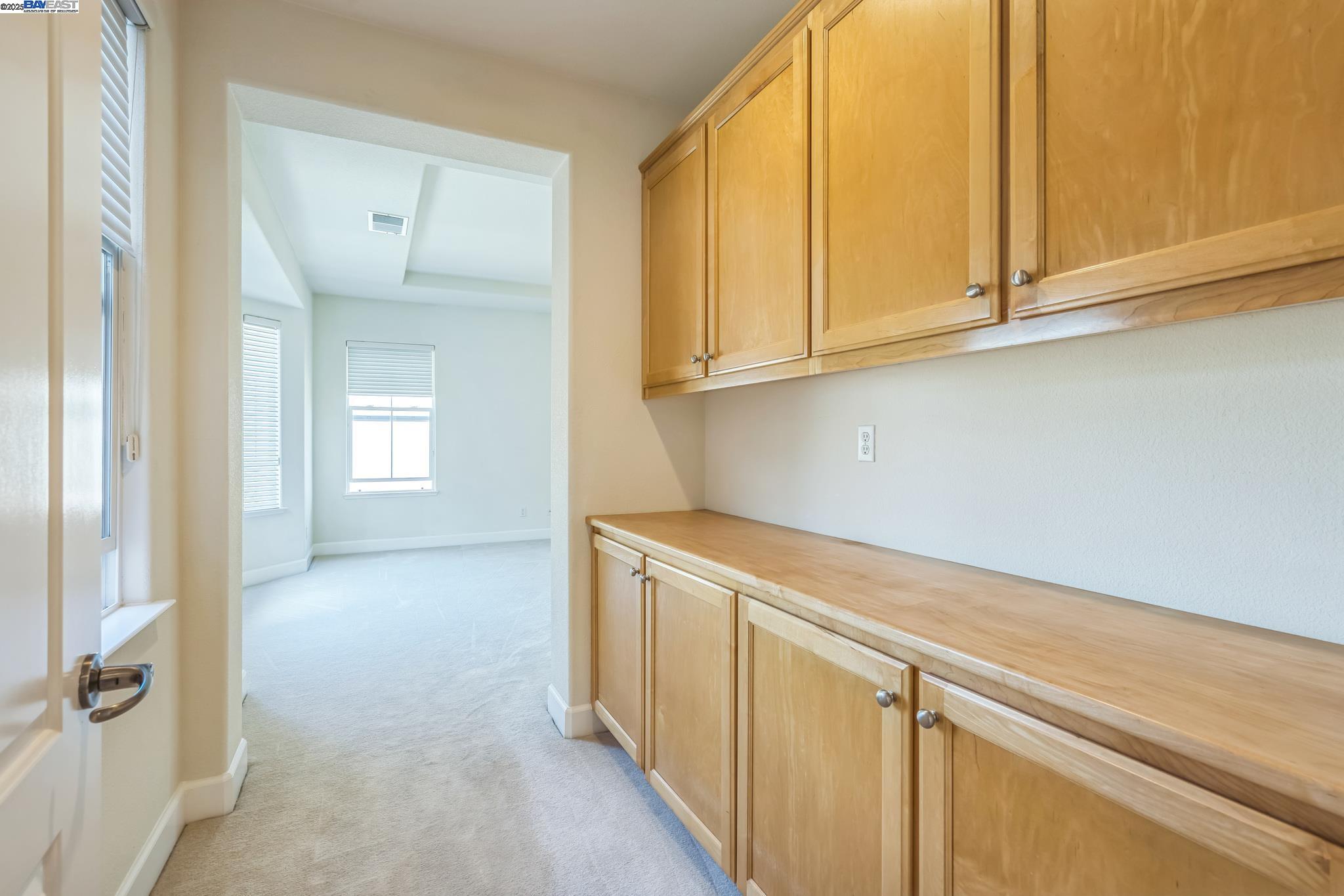 5591 Newfields Lane Dublin, CA 94568 - Photo 13 of 24 a view of cabinets and wooden floor