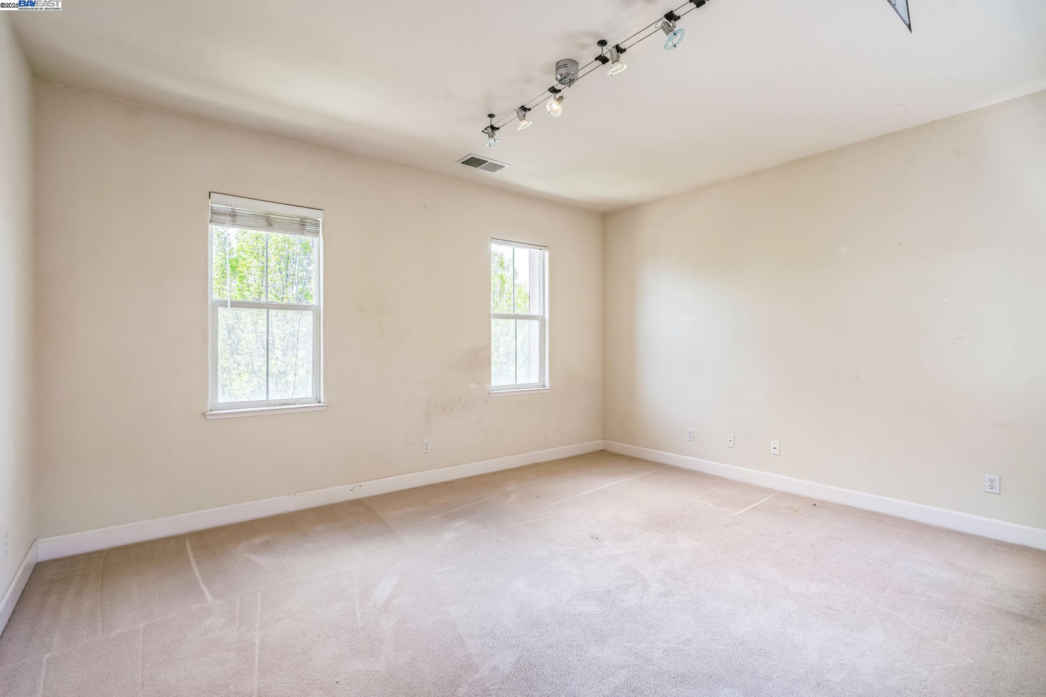 5591 Newfields Lane Dublin, CA 94568 - Photo 14 of 24 a view of an empty room with a window