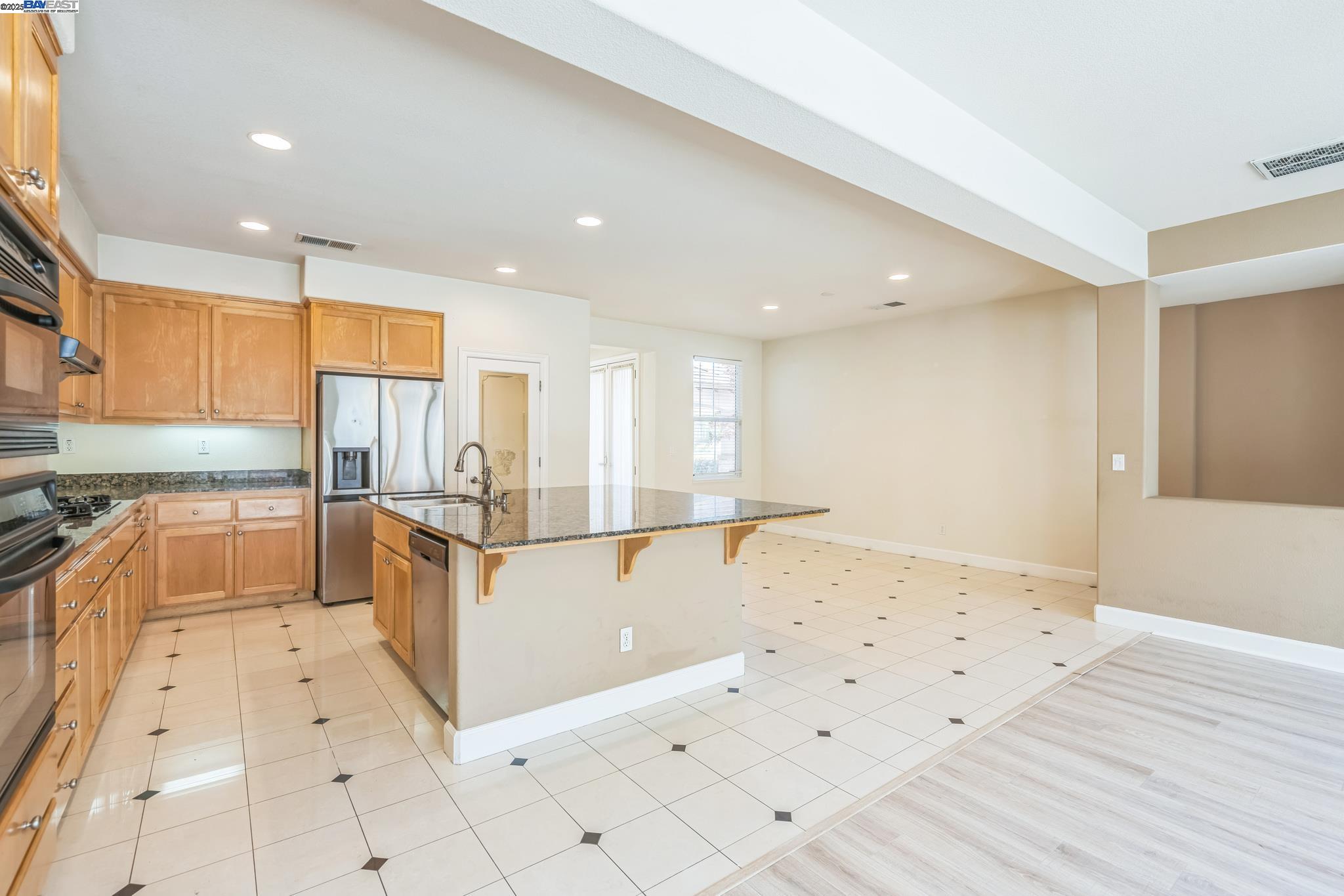 5591 Newfields Lane Dublin, CA 94568 - Photo 6 of 24 a kitchen with stainless steel appliances a sink and cabinets