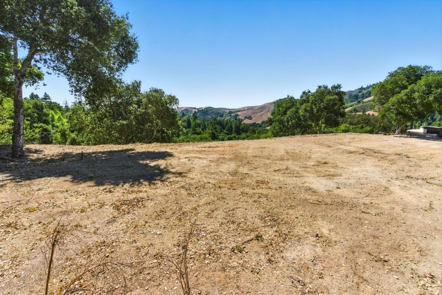 12725 Old La Honda Road Woodside, CA 94062 - Photo 14 of 30 a view of dirt field with trees in background