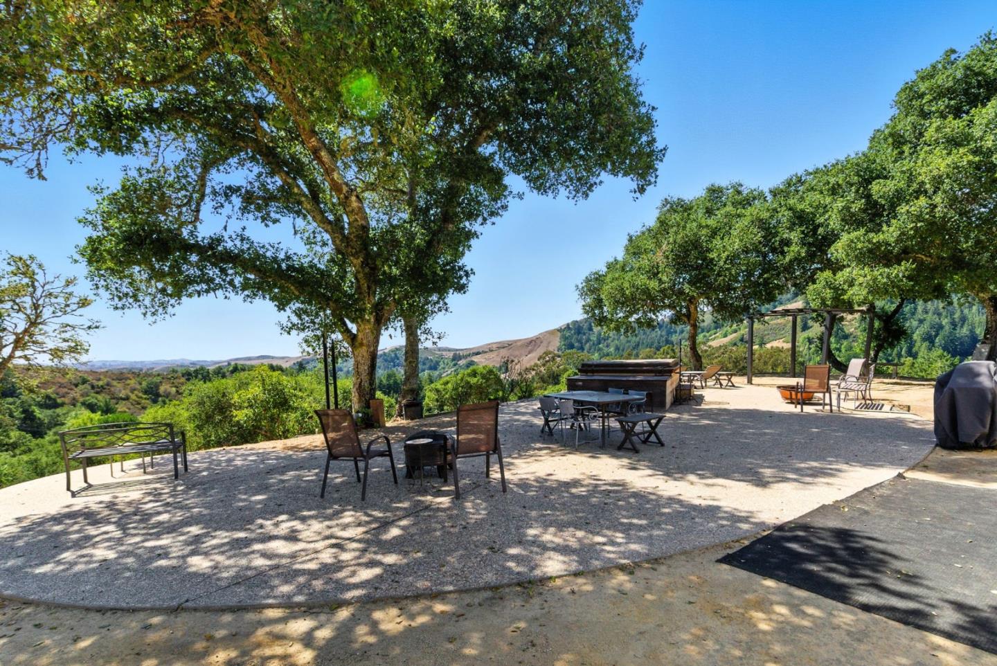 12725 Old La Honda Road Woodside, CA 94062 - Photo 6 of 30 a view of backyard with swimming pool and sitting area