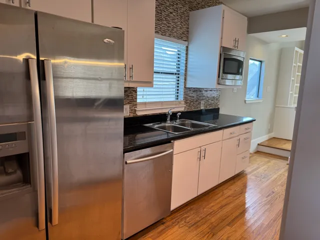 a room with window and walk in closet