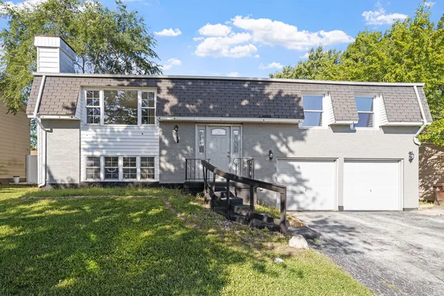 front view of a house with a big yard