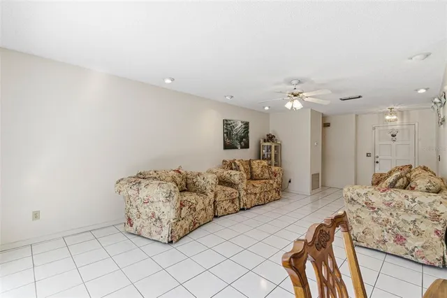 a bedroom with a bed and a night stand