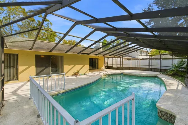 a view of a balcony with swimming pool