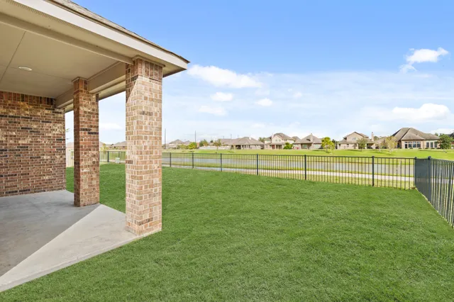 a view of a park with a large trees