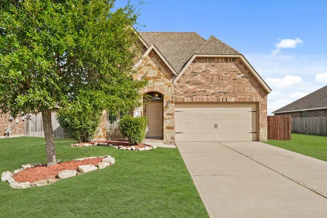 a view of a house with garden