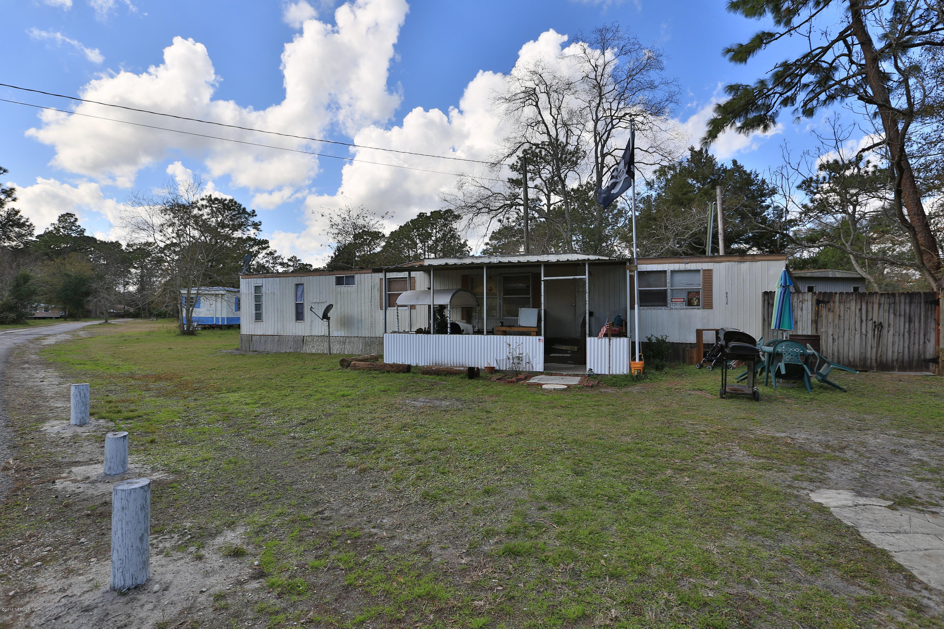 6606 Ricker Road Jacksonville, FL 32244 - Photo 8 of 26 a view of a house with backyard