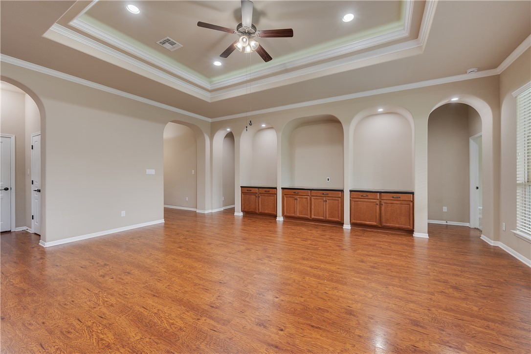 3085 Archer Circle Bryan, TX 77808 - Photo 4 of 31 a view of an empty room with wooden floor