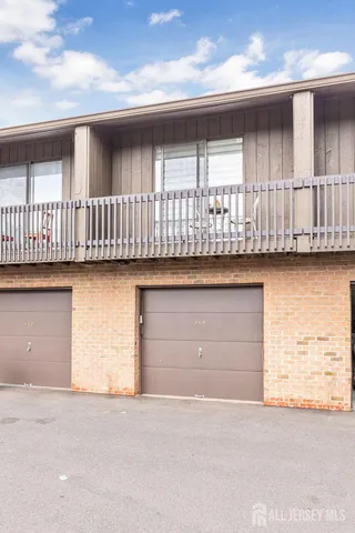 a view of wooden floor and a window in an empty room