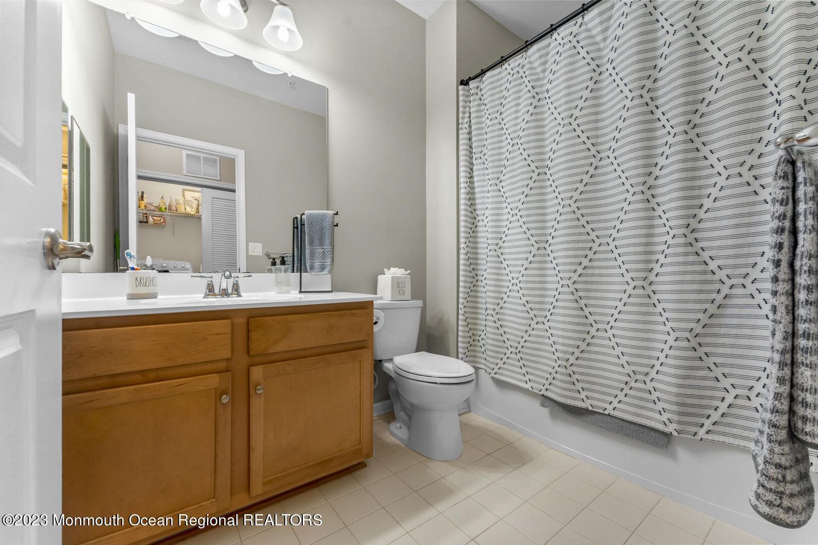1 Kyle Drive Tinton Falls, NJ 07712 - Photo 15 of 21 a bathroom with a toilet a sink and mirror