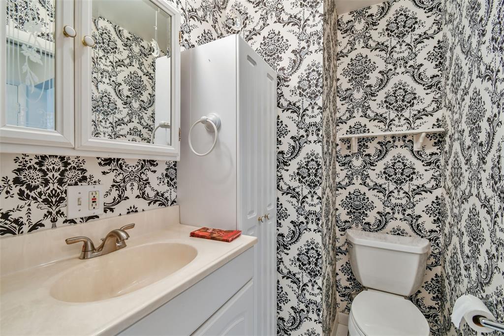 8319 Annwood Road Seminole, FL 33777 - Photo 19 of 27 a bathroom with a sink and a toilet