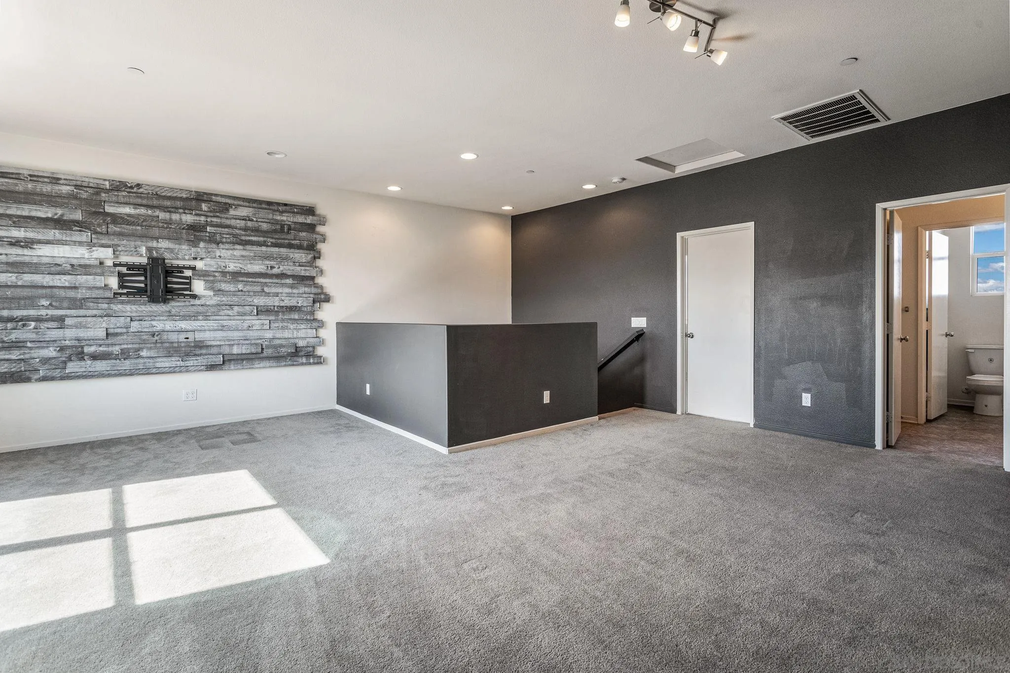 1520 Santa Carolina Road, Unit 4 Chula Vista, CA 91913 - Photo 11 of 15 a view of an empty room with kitchen and window