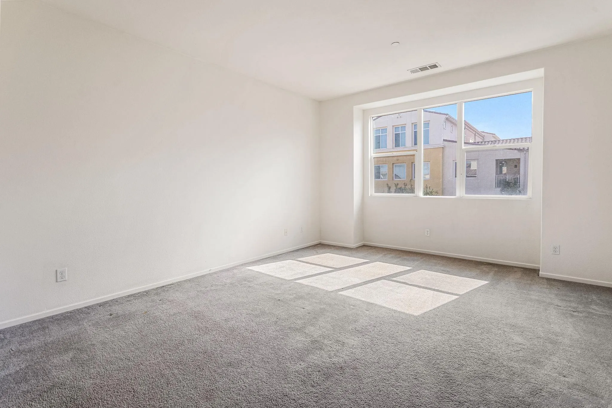 1520 Santa Carolina Road, Unit 4 Chula Vista, CA 91913 - Photo 13 of 15 a view of an empty room with a window