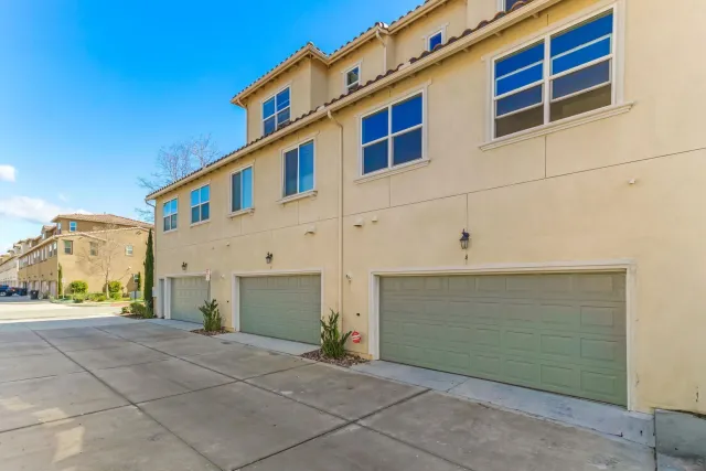 a view of a house with a garage