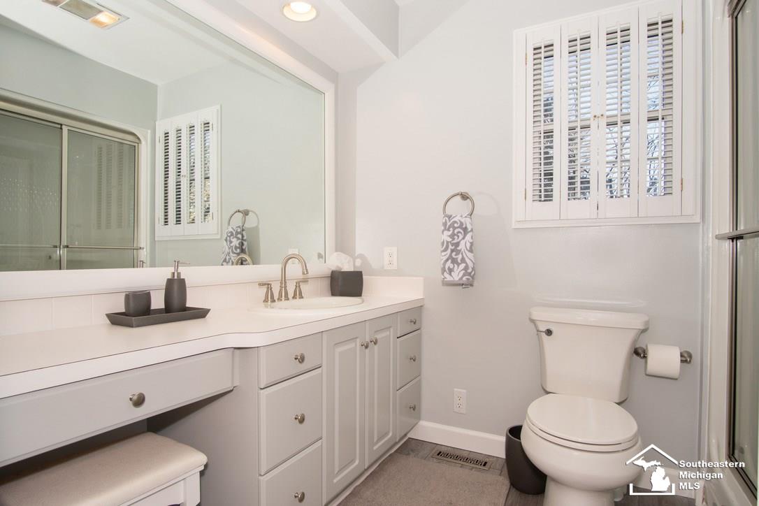 744 East Hurd Road Monroe, MI 48162 - Photo 18 of 68 MAIN FLOOR OWNERS SUITE FULL BATH W/ STAND UP SHOWER
