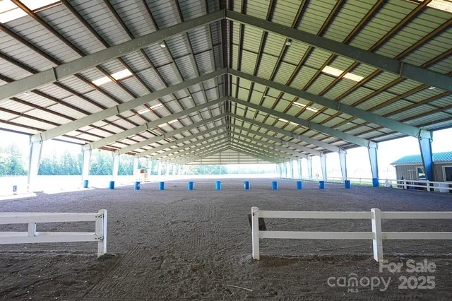 a view of an empty room with stairs