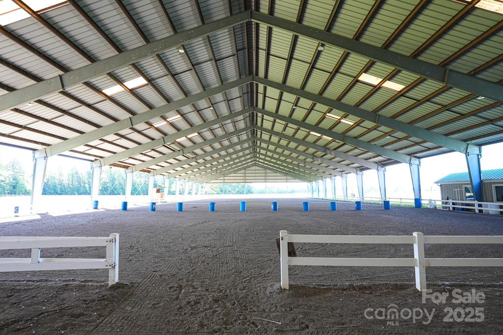 9167 Hasty Road Laurinburg, NC 28352 - Photo 12 of 48 a view of an empty room with stairs