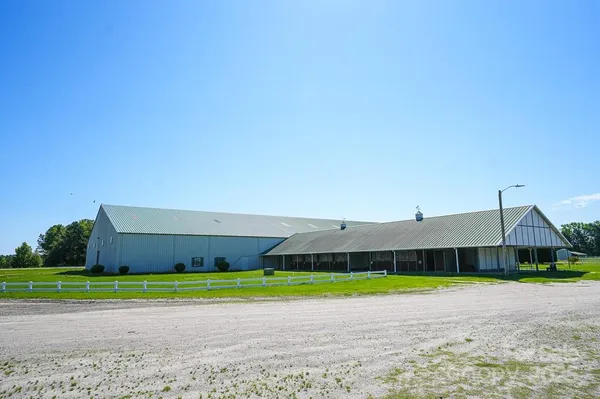 a view of a building and a yard