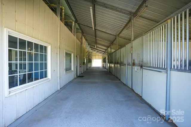 a view of empty room with windows