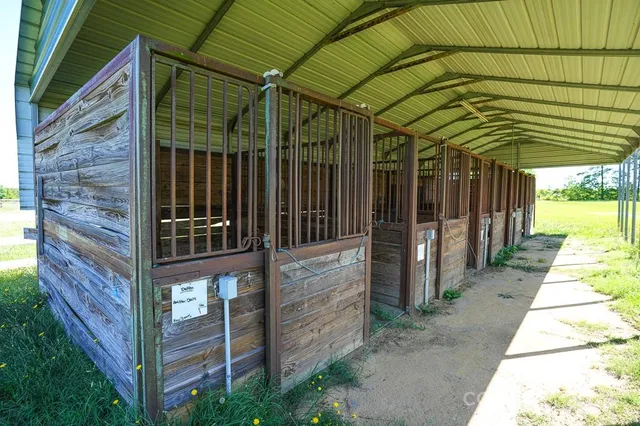 swimming pool view with a lake view
