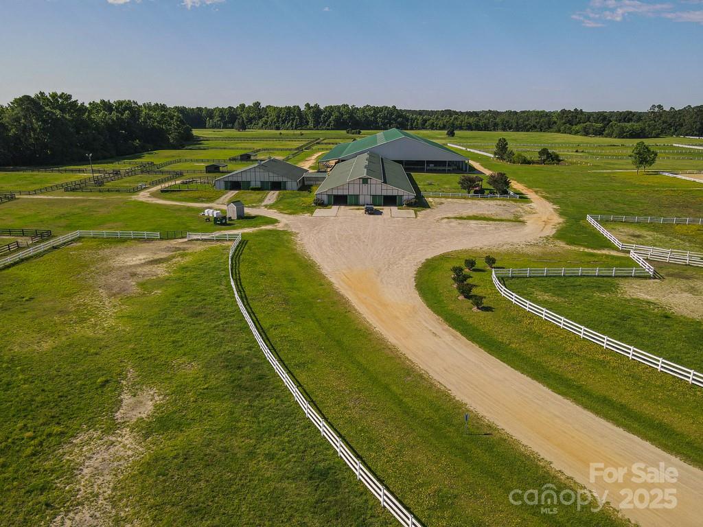 9167 Hasty Road Laurinburg, NC 28352 - Photo 22 of 48 swimming pool view with a lake view