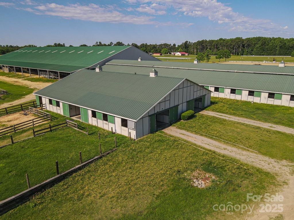 9167 Hasty Road Laurinburg, NC 28352 - Photo 30 of 48 a view of a house with a outdoor space