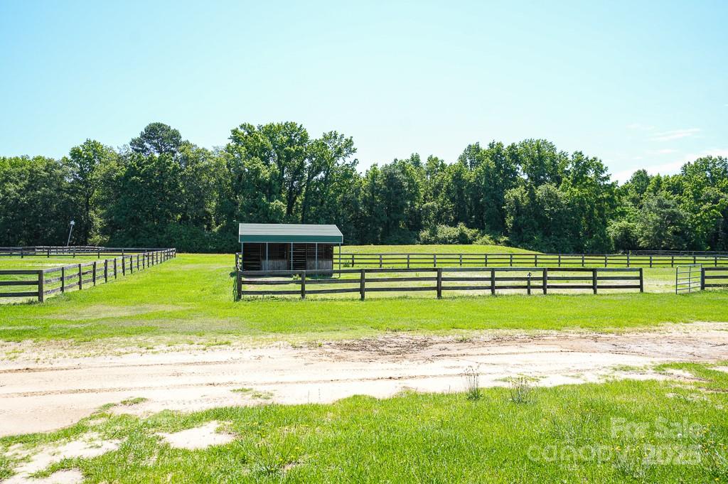 9167 Hasty Road Laurinburg, NC 28352 - Photo 32 of 48 a view of a park and entertaining space