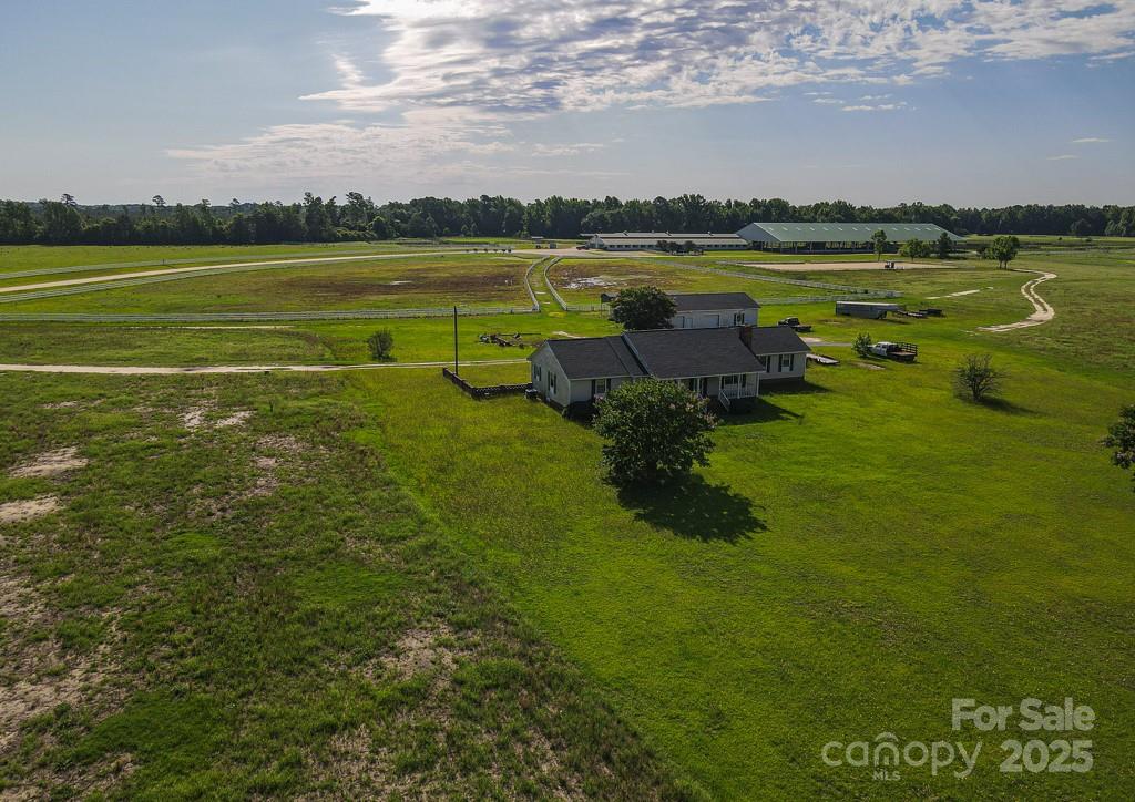 9167 Hasty Road Laurinburg, NC 28352 - Photo 37 of 48 a view of a lake with a city