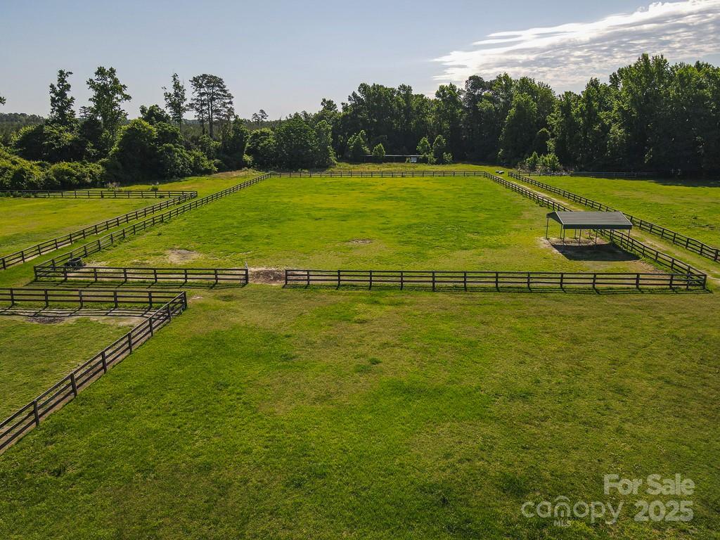 9167 Hasty Road Laurinburg, NC 28352 - Photo 44 of 48 a view of an outdoor space and swimming pool